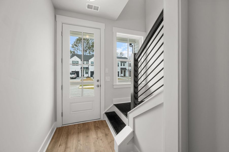 Photo is of a similar home