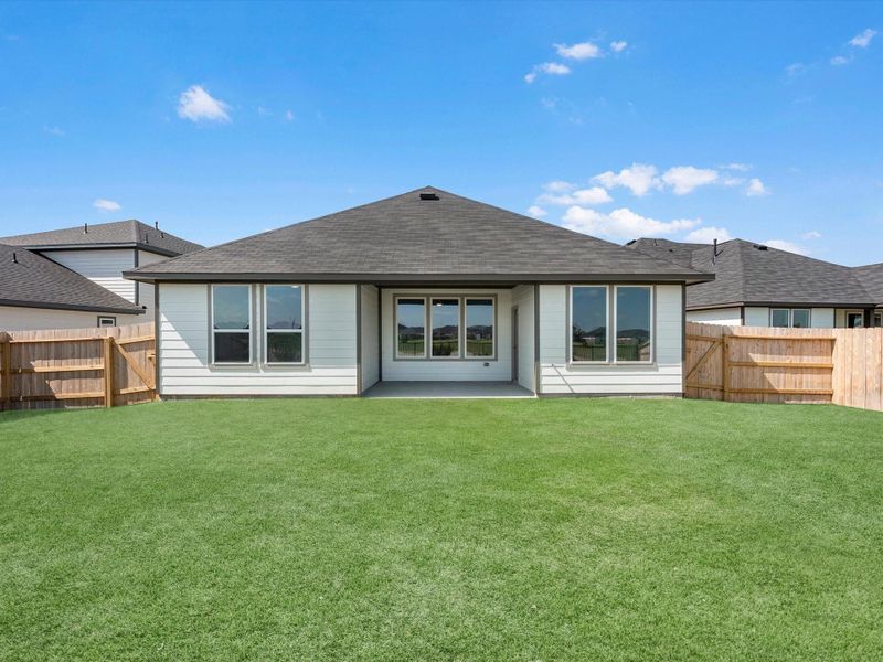 Exterior details and patio area of a home in Mason Woods, Cypress (Image 4).
