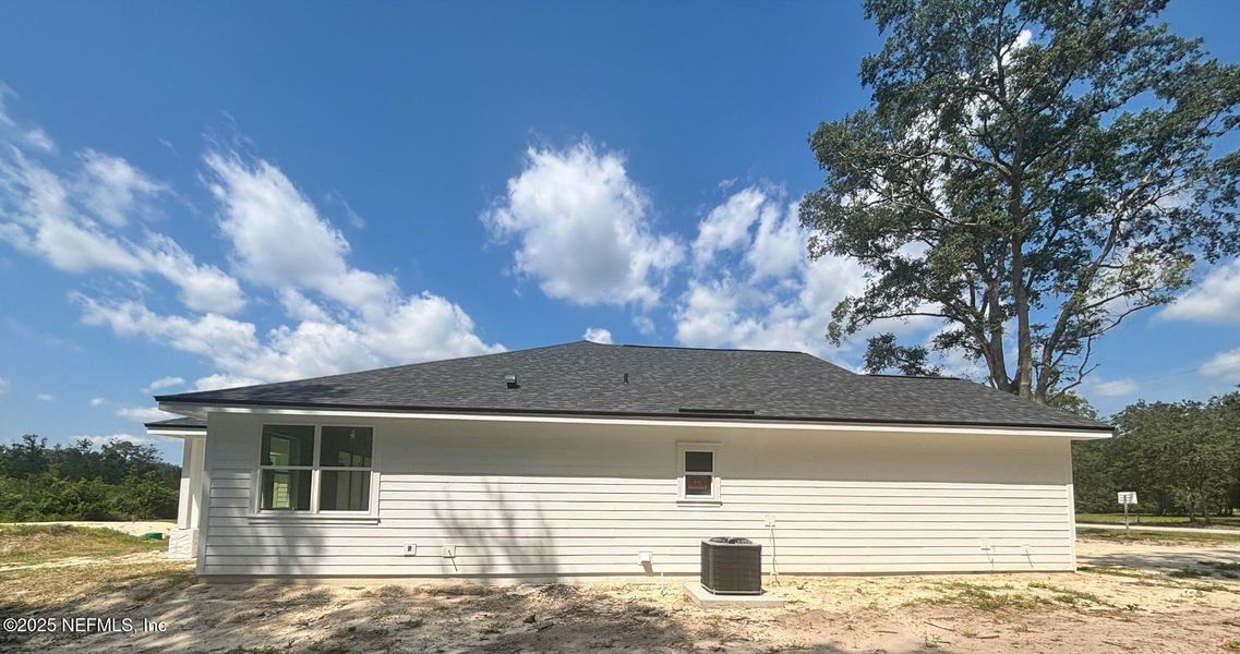 Front exterior of a new home in , Melrose, FL, highlighting curb appeal (Image 13). Front exterior of a new home in , Melrose, FL, highlighting curb appeal (Image 13).
