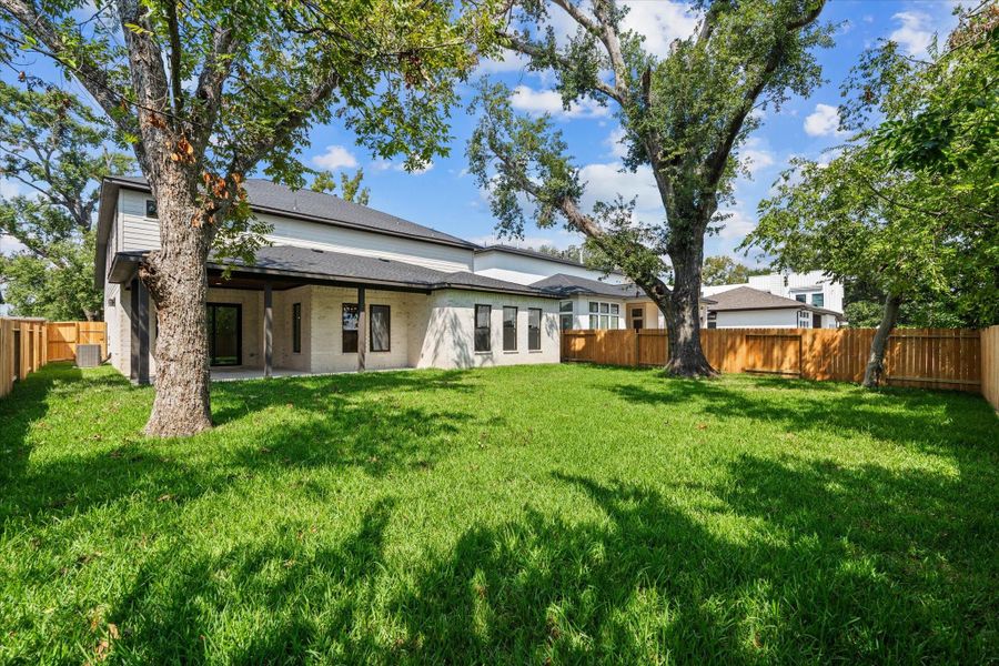 Front exterior of a new home in , Houston, TX, highlighting curb appeal (Image 24).