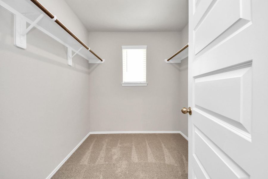 Primary walk-in-closet Primary walk-in-closet
