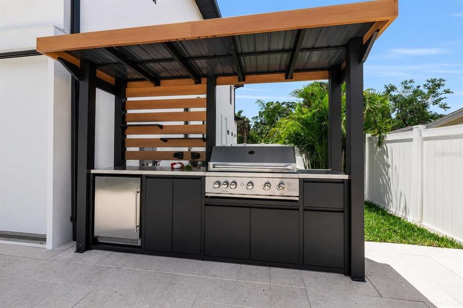 Exterior details and patio area of a home in , Sarasota (Image 32).