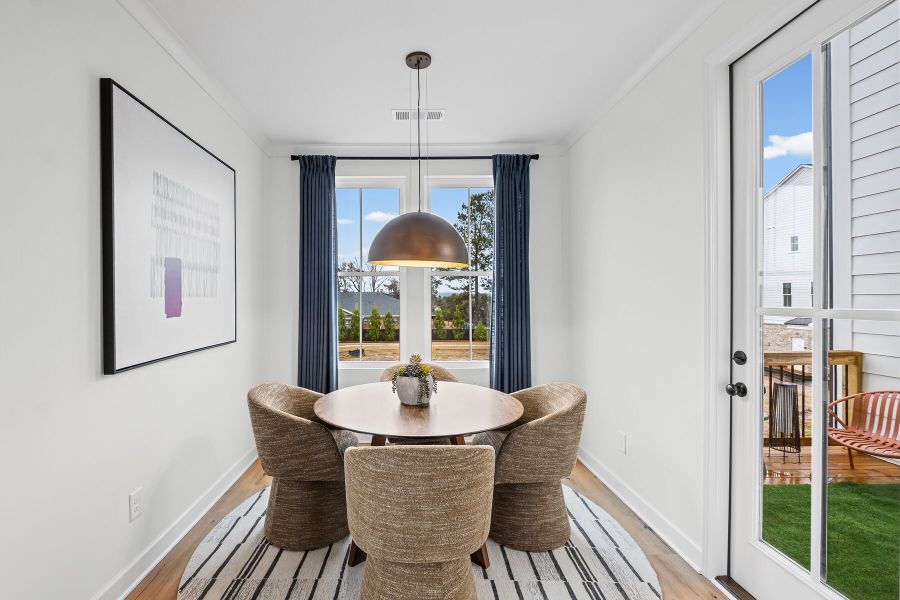 Representative furnished interior of a home built from the The Greenfield by JW Collection in The Village at River Green, Canton (Image 11).