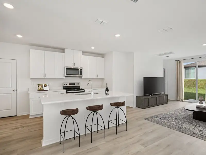 Furnished interior view inside a new home in Magnolia Bay - Premier Series, Nokomis (Image 5).