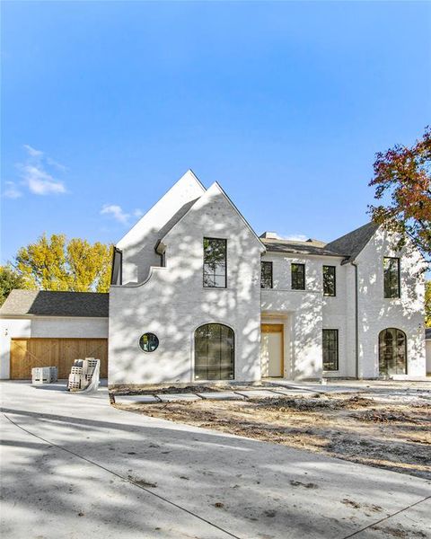 Front exterior of a new home in , Dallas, TX, highlighting curb appeal (Image 20).