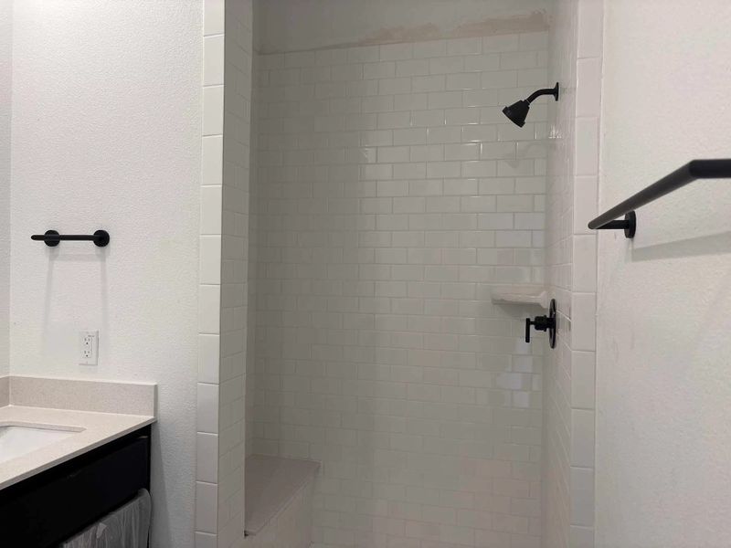 Primary Bathroom Construction Progress featuring the Noir Collection