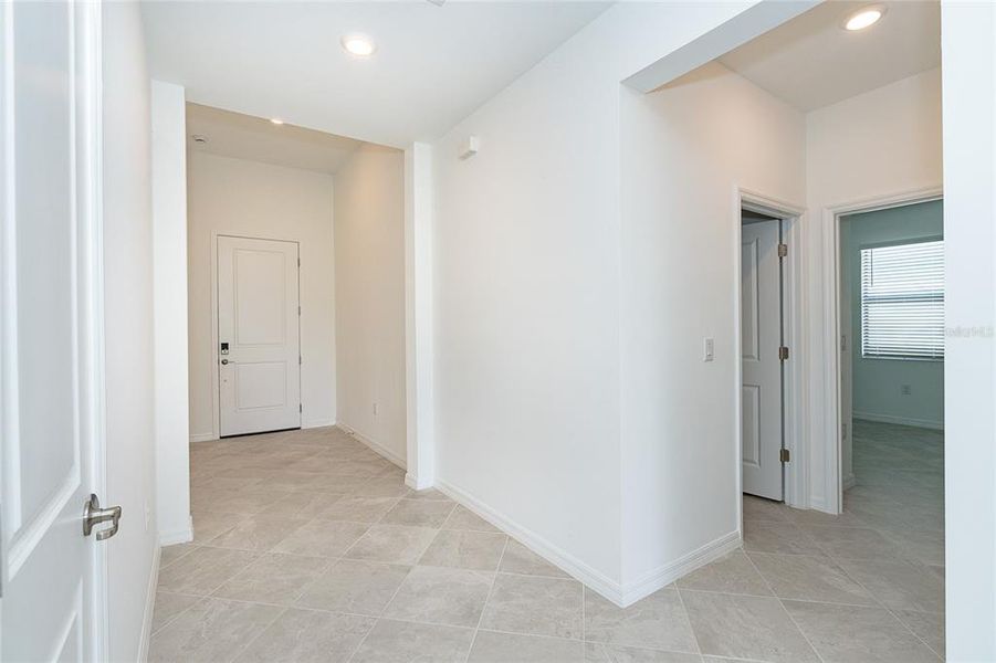 Spacious, unfurnished interior of a new home in , Port Charlotte (Image 27).