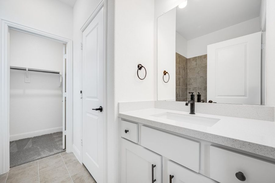 Representative furnished interior of a home built from the Sapphire by Taylor Morrison in Highland Lakes 60s, McKinney (Image 8).