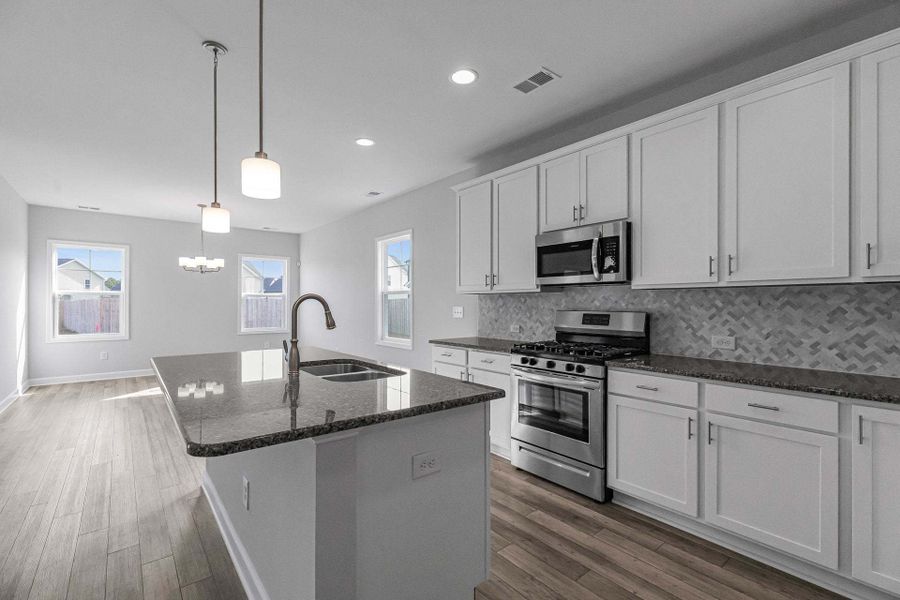 Representative furnished interior of a home built from the Dogwood by Caviness & Cates Communities in Maggie Way, Wendell (Image 126).