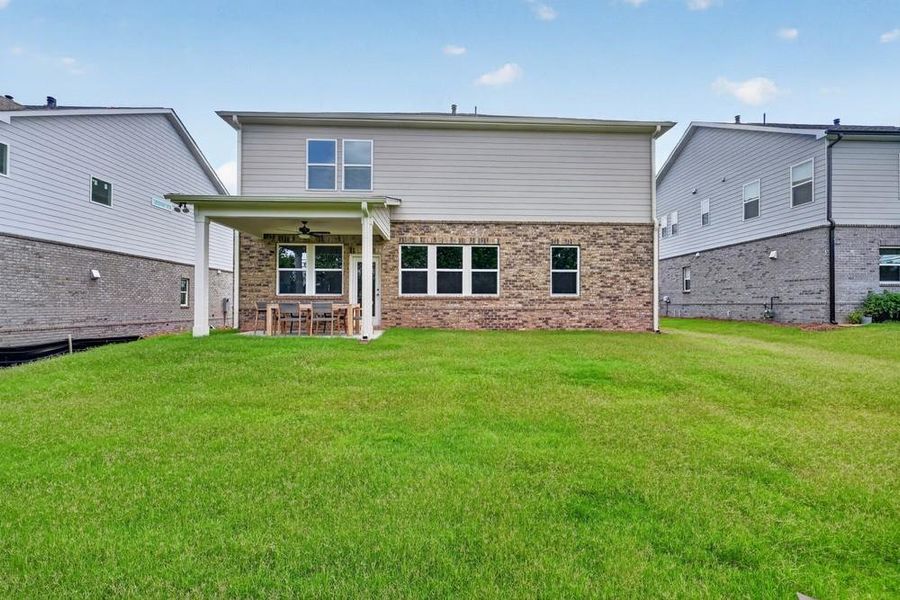 Exterior details and patio area of a home in Bennett Farm, Loganville (Image 3).