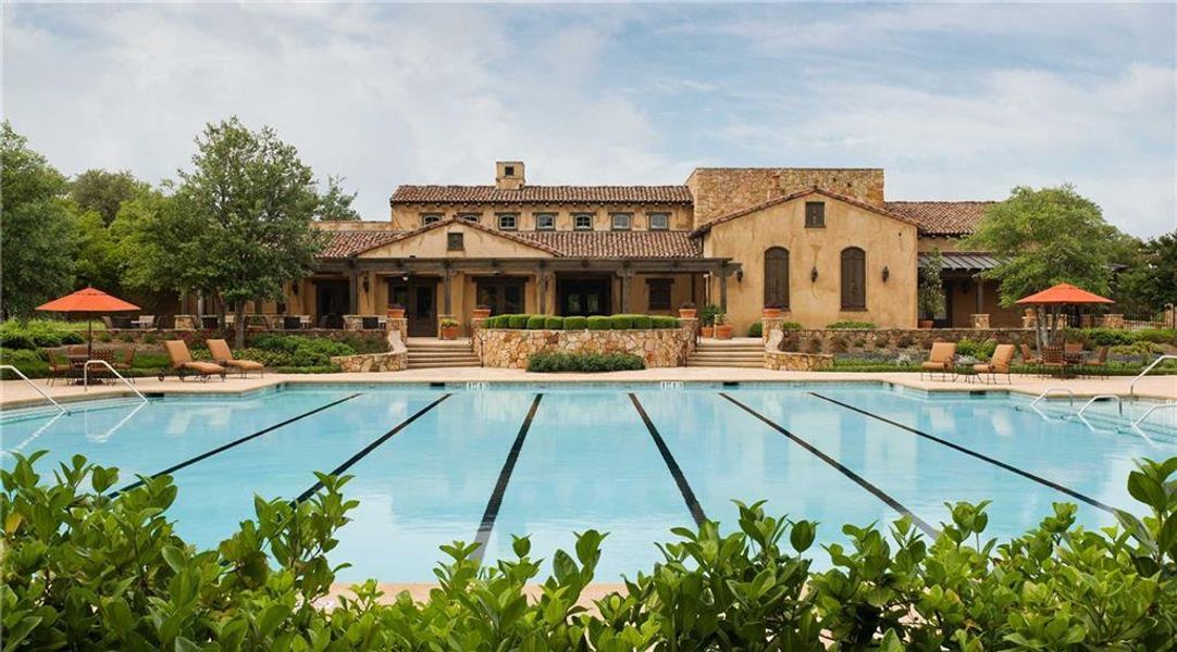 Community pool featuring a patio