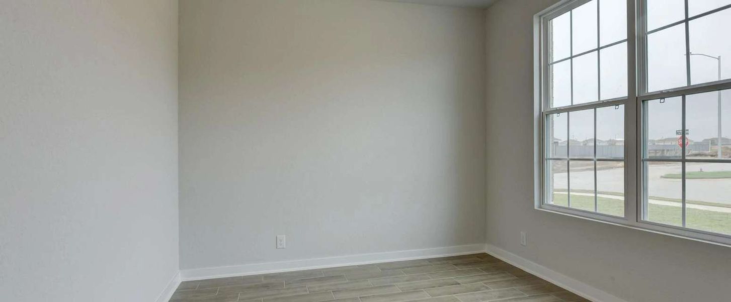 Representative unfurnished interior of a home built from the Guadalupe by Ashton Woods in Saddlebrook Ranch, Schertz (Image 14).