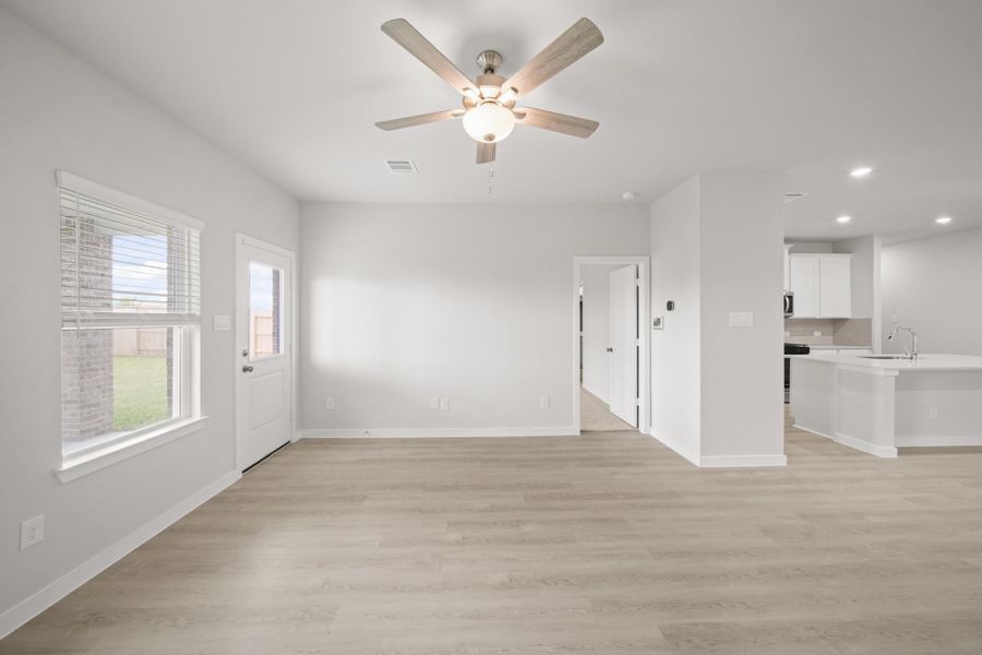 Spacious, unfurnished interior of a new home in Sunterra, Katy (Image 21).
