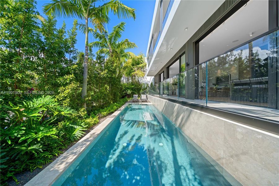 Exterior details and patio area of a home in , Miami Beach (Image 33).