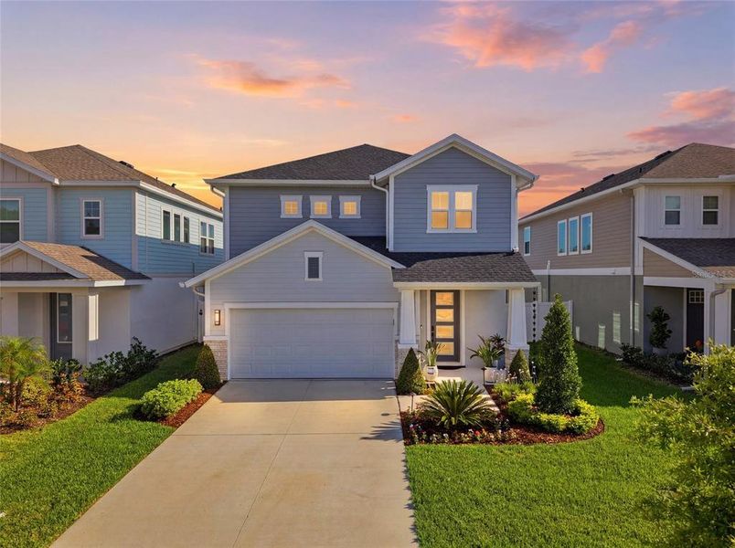Front exterior of a new home in , Wesley Chapel, FL, highlighting curb appeal (Image 23). Front exterior of a new home in , Wesley Chapel, FL, highlighting curb appeal (Image 23).