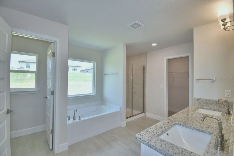 Furnished interior view inside a new home in Lake Juliana Estates, Auburndale (Image 8).