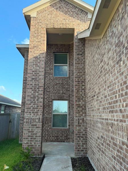 Exterior details and patio area of a home in Windrose Green, Angleton (Image 2). Exterior details and patio area of a home in Windrose Green, Angleton (Image 2).