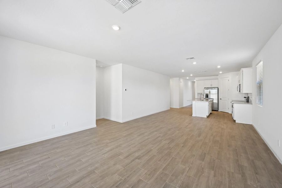 Great room, dining and kitchen Great room, dining and kitchen