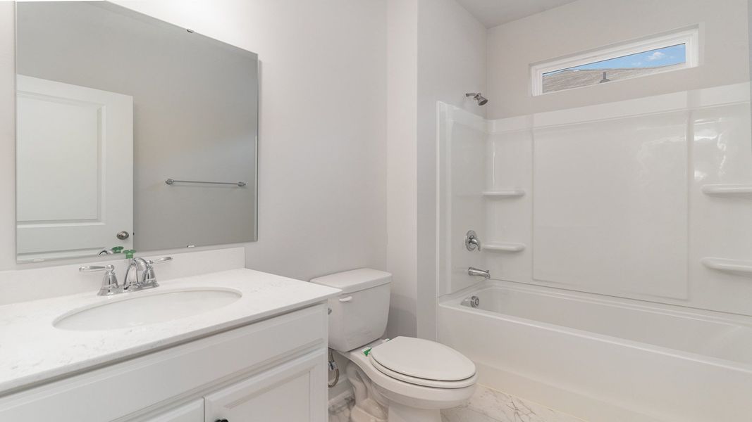 Representative furnished interior of a home built from the DARBY by D.R. Horton in Spring View Landing, Loris (Image 3).