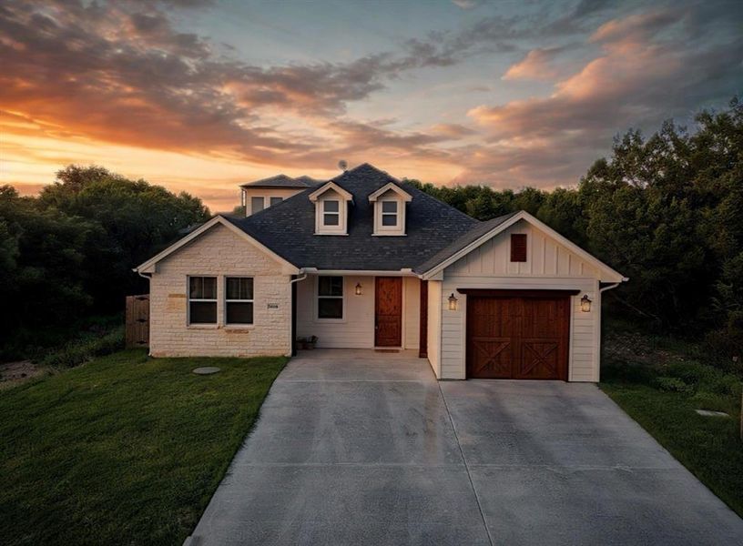 Front exterior of a new home in , Granbury, TX, highlighting curb appeal (Image 2).