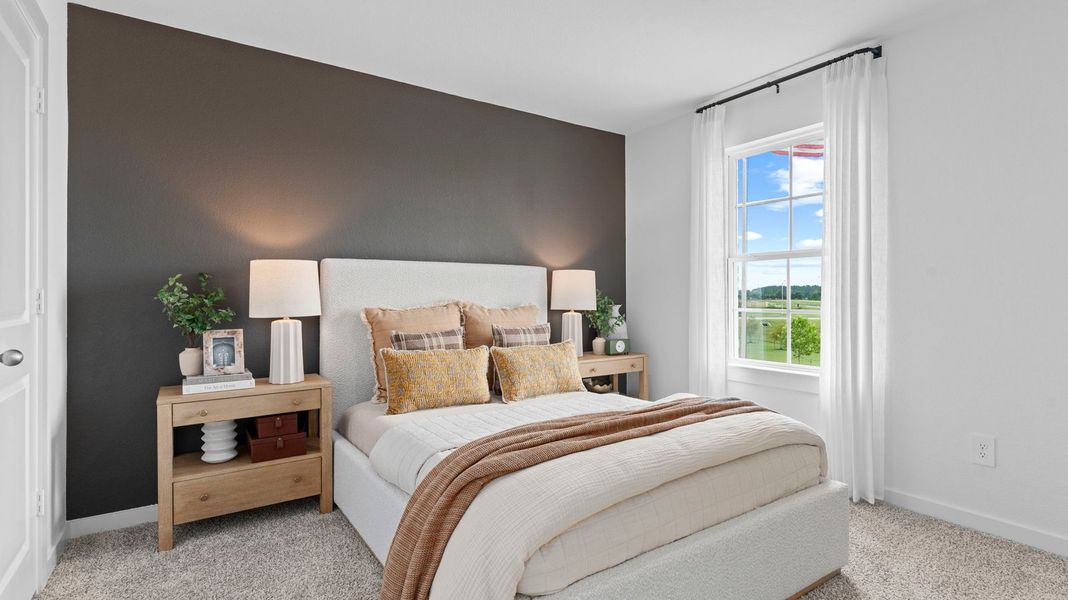 Furnished interior view inside a new home in Caldwell Crossing, Iowa Colony (Image 12).