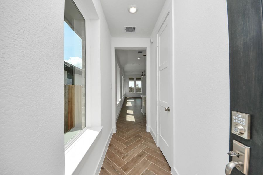 Spacious, unfurnished interior of a new home in Amira: Premier Collection, Tomball (Image 22).