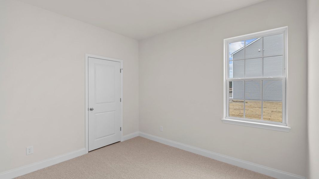 Spacious, unfurnished interior of a new home in Villa Grande, Winterville (Image 28).