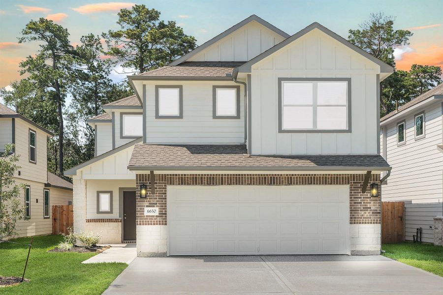 Front exterior of a new home in Cypresswood Landing, Humble, TX, highlighting curb appeal (Image 2).