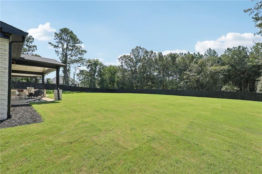 Front exterior of a new home in , Hoschton, GA, highlighting curb appeal (Image 32). Front exterior of a new home in , Hoschton, GA, highlighting curb appeal (Image 32).