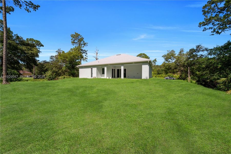 Exterior details and patio area of a home in , Lehigh Acres (Image 22). Exterior details and patio area of a home in , Lehigh Acres (Image 22).