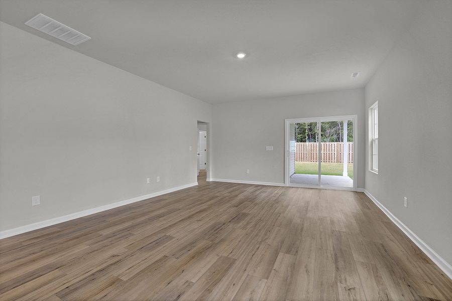 Spacious, unfurnished interior of a new home in River Tide Farms, Bolivia (Image 16).