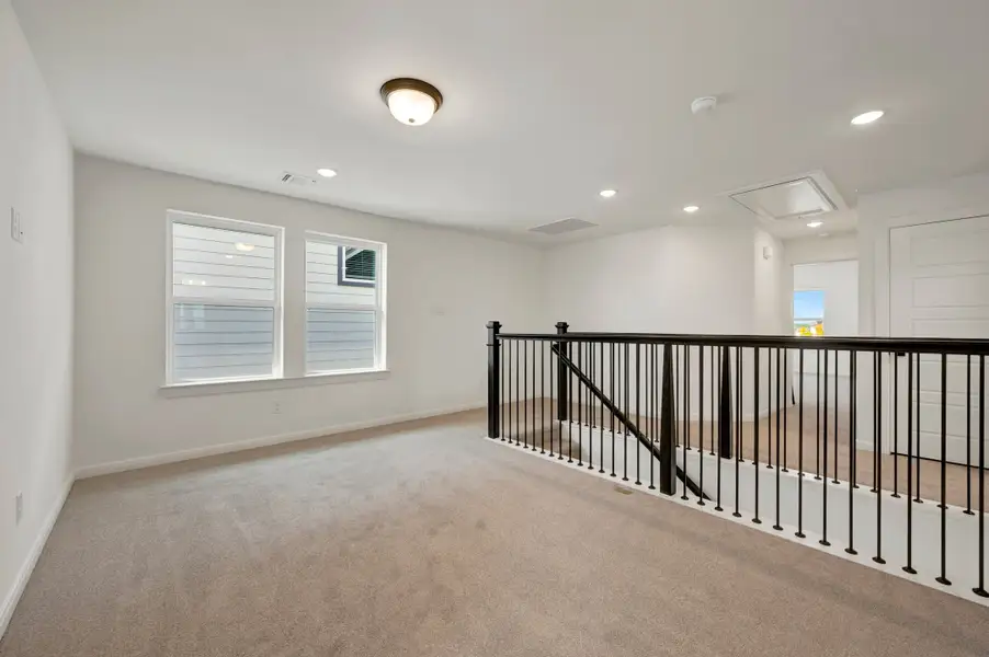 Spacious, unfurnished interior of a new home in Painted Tree Woodland West – Cottages, McKinney (Image 15).