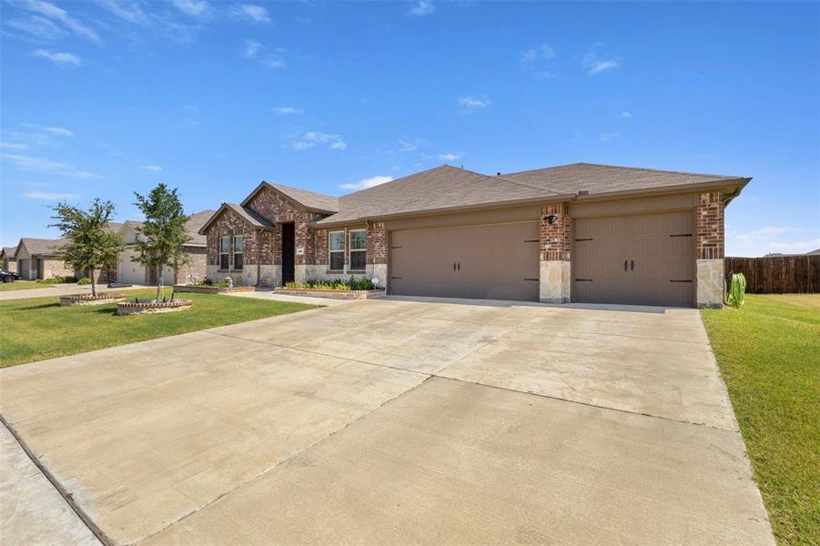 Front exterior of a new home in Waverly Estates, Josephine, TX, highlighting curb appeal (Image 18).