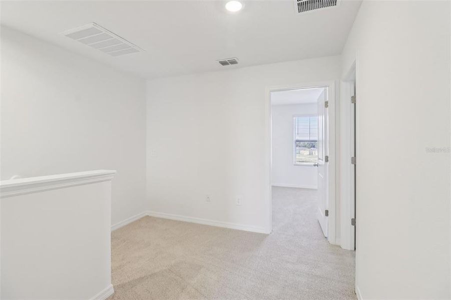 Spacious, unfurnished interior of a new home in The Reserve at Hammock Oaks Townes, Lady Lake (Image 18). Spacious, unfurnished interior of a new home in The Reserve at Hammock Oaks Townes, Lady Lake (Image 18).