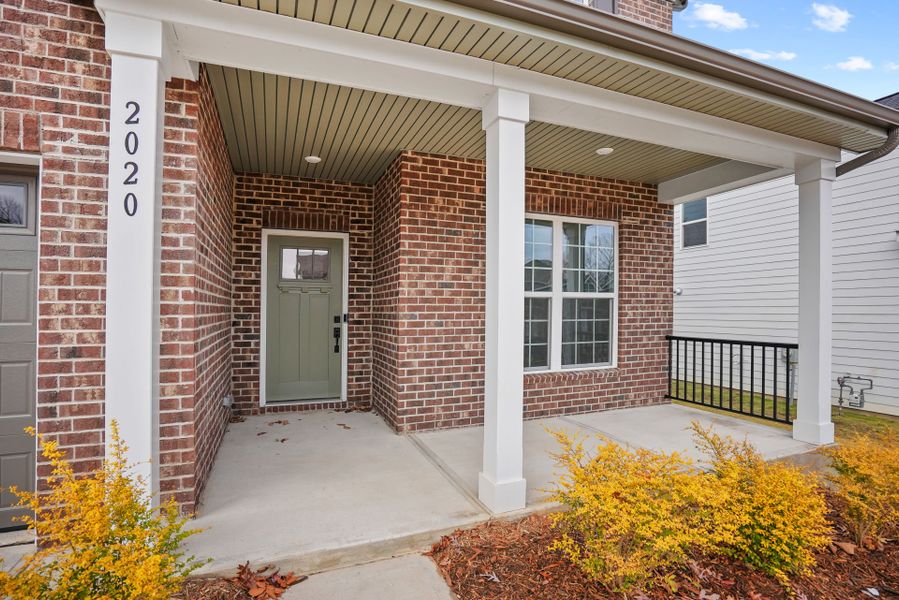 Exterior details and patio area of a home in Forest Creek, Waxhaw (Image 38).