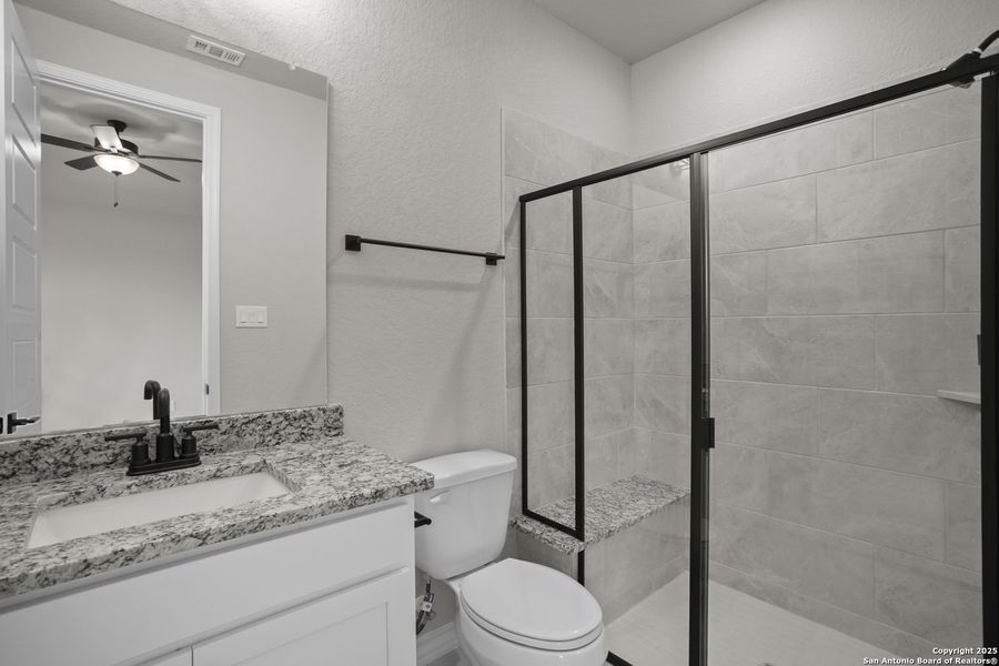Furnished interior view inside a new home in Potranco Oaks, Castroville (Image 51).