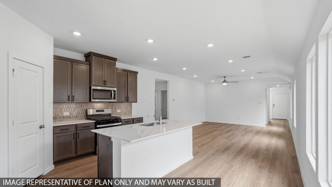 Furnished interior view inside a new home in Sunterra Lakes, Katy (Image 6).