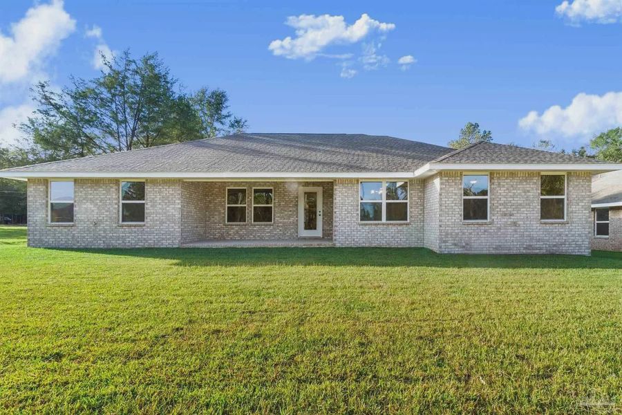 Exterior details and patio area of a home in Pecan Valley, Cantonment (Image 2). Exterior details and patio area of a home in Pecan Valley, Cantonment (Image 2).