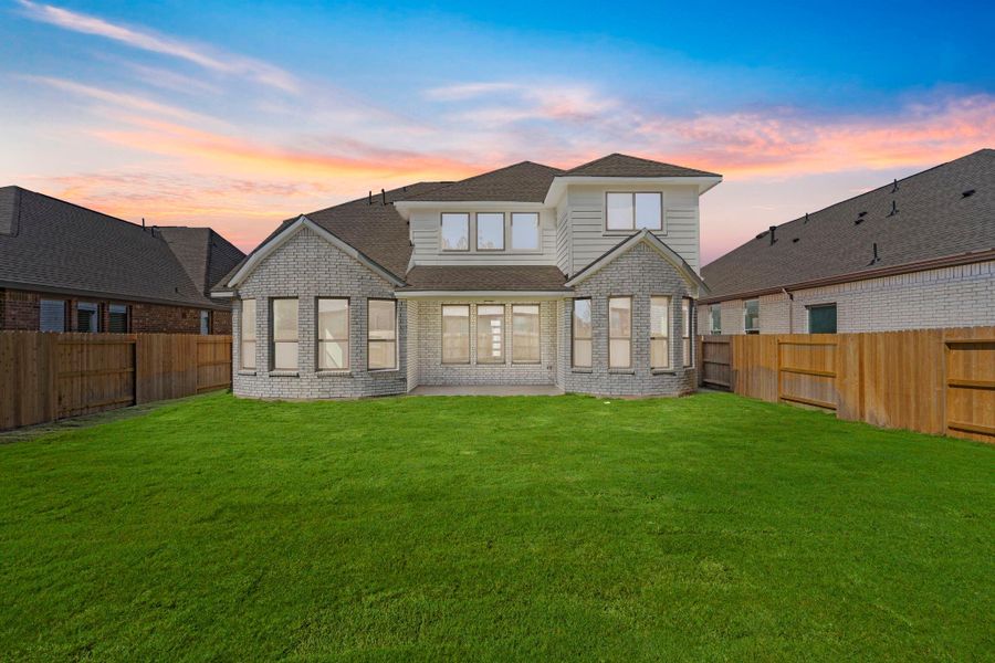 Exterior details and patio area of a home in The Trails, New Caney (Image 26).