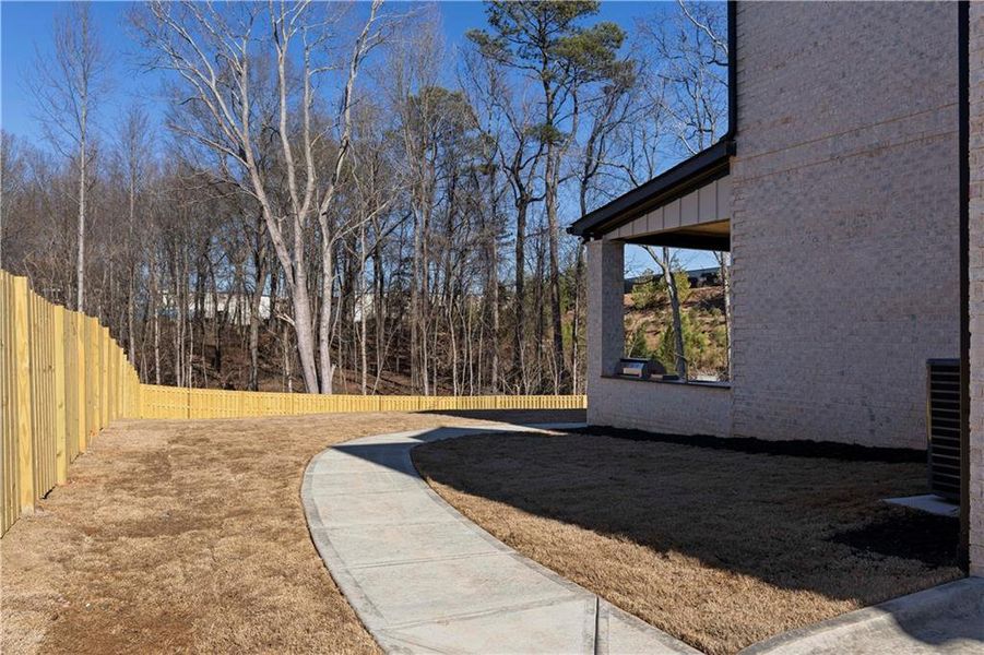 Exterior details and patio area of a home in , Suwanee (Image 35).