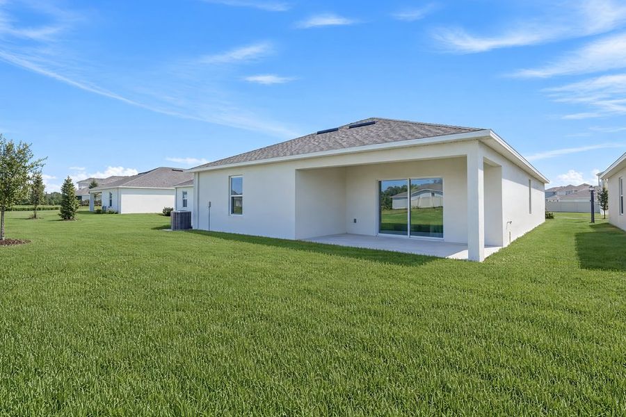 Exterior details and patio area of a home in Firethorn, Parrish (Image 4).