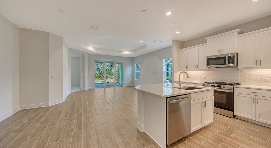 Furnished interior view inside a new home in Wildleaf, Parrish (Image 6).