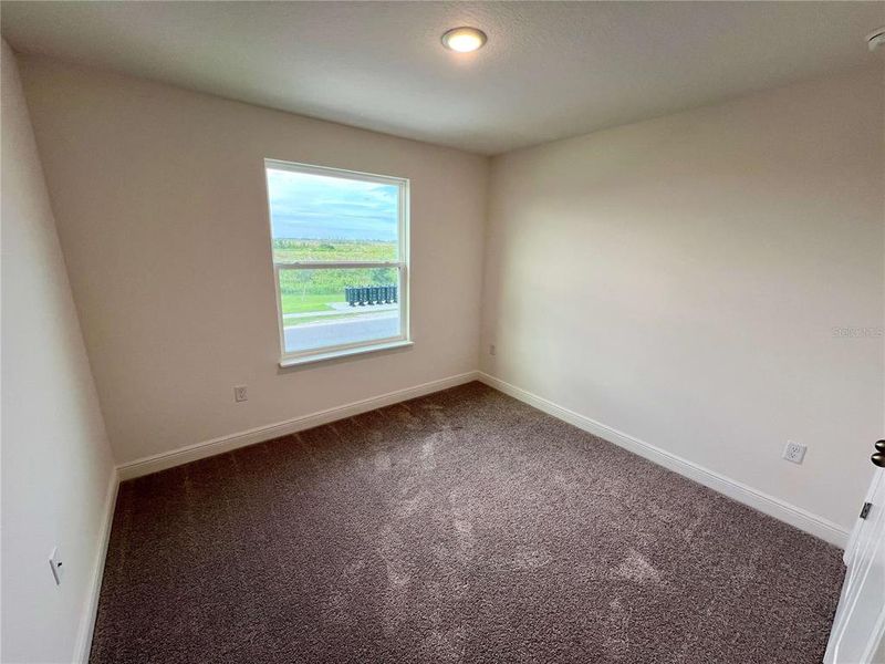 Spacious, unfurnished interior of a new home in Hammock Reserve, Haines City (Image 13).