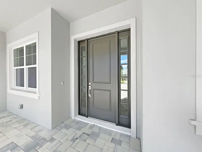 Exterior details and patio area of a home in Southern Hills Plantation, Brooksville (Image 3).