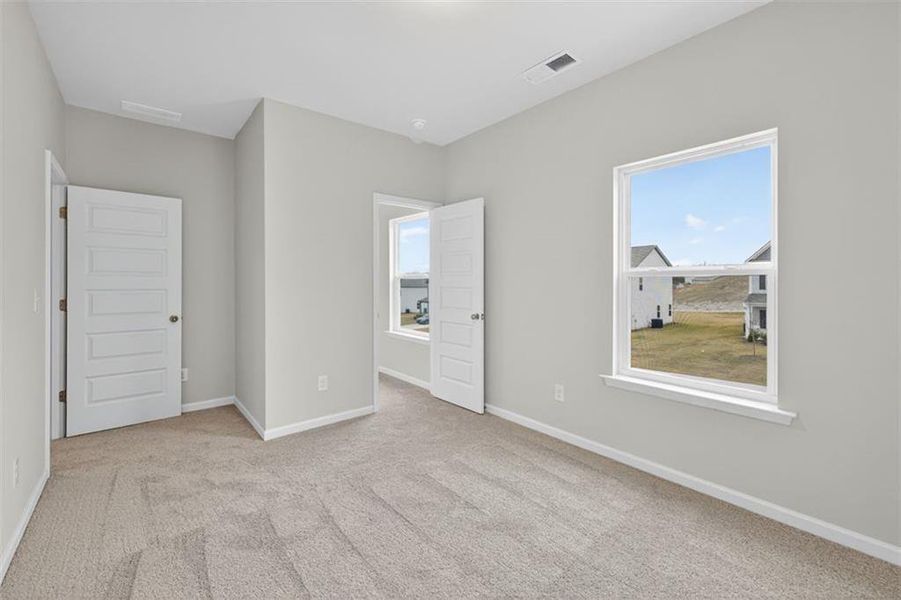 Spacious, unfurnished interior of a new home in Roxeywood Park, Winder (Image 36).