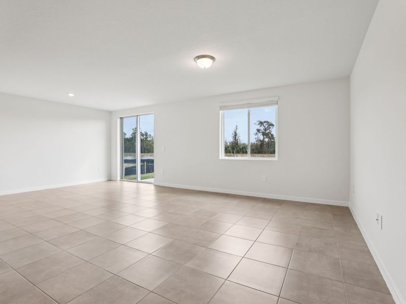 Spacious, unfurnished interior of a new home in The Grove at Stuart Crossing - Classic Series, Bartow (Image 11).