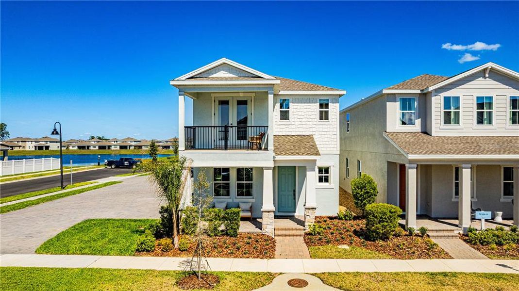Front exterior of a new home in , Winter Garden, FL, highlighting curb appeal (Image 22). Front exterior of a new home in , Winter Garden, FL, highlighting curb appeal (Image 22).