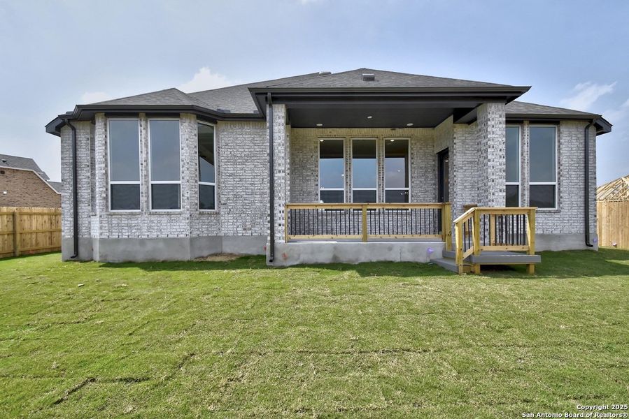 Front exterior of a new home in Alsatian Oaks: 60ft. lots, Castroville, TX, highlighting curb appeal (Image 17).