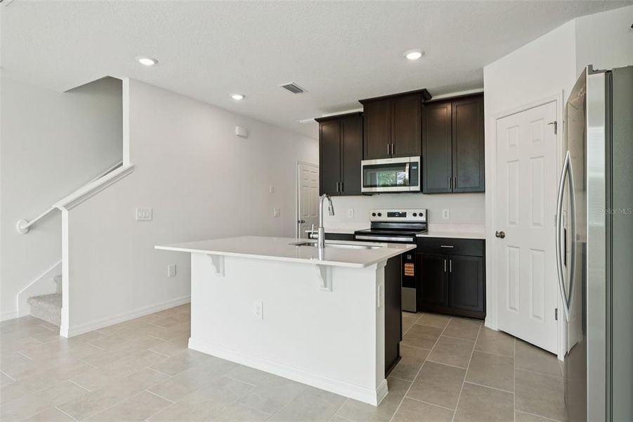 Furnished interior view inside a new home in Cagan Crossings West, Clermont (Image 5).