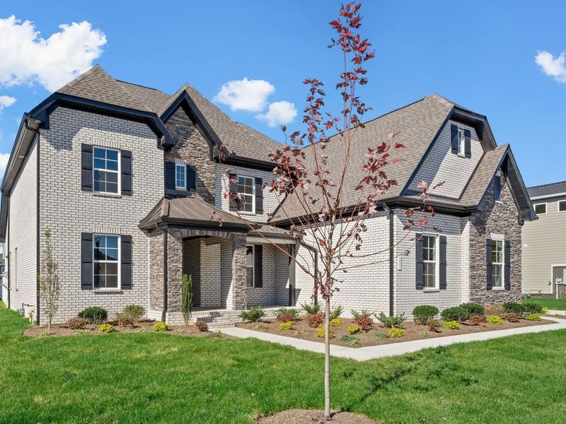 Front exterior of a new home in Shelton Square, Murfreesboro, TN, highlighting curb appeal (Image 2).
